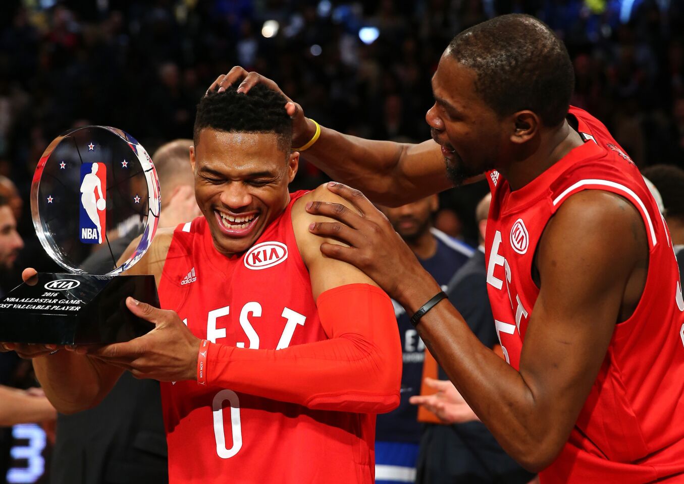 Thunder guard Russell Westbrook is congratulated by teammate Kevin Durant after winning the All-Star game MVP award.