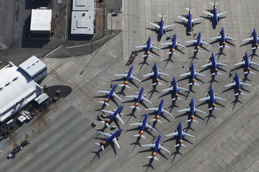 A number of Southwest Airlines Boeing 737 MAX aircraft are parked at Southern California Logistics Airport on March 27, 2019 in Victorville, California. Southwest Airlines is waiting out a global grounding of MAX 8 and MAX 9 aircraft at the airport. (Mario Tama/Getty Images/TNS) ** OUTS - ELSENT, FPG, TCN - OUTS **