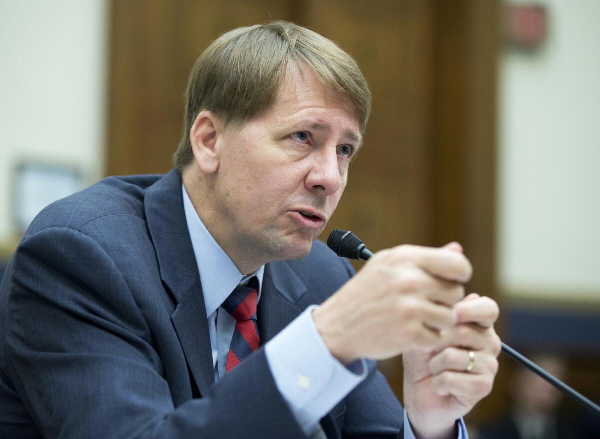 Richard Cordray, director of the Consumer Financial Protection Bureau, testifies before Congress in 2013.