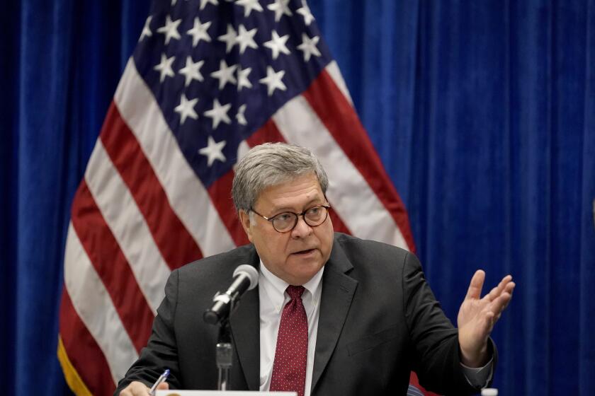 FILE - In this Oct. 15, 2020, file photo U.S. Attorney General William Barr speaks during a roundtable discussion on Operation Legend in St. Louis. Even before Barr issued a memo that authorized federal prosecutors across the country to investigate “substantial allegations” of voting irregularities if they exist, the Justice Department had already begun looking into two specific allegations. (AP Photo/Jeff Roberson, File)