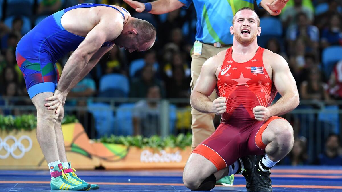 USA's Kyle Snyder celebrates his gold medal over Azerbaijan's Khetag Goziumov i