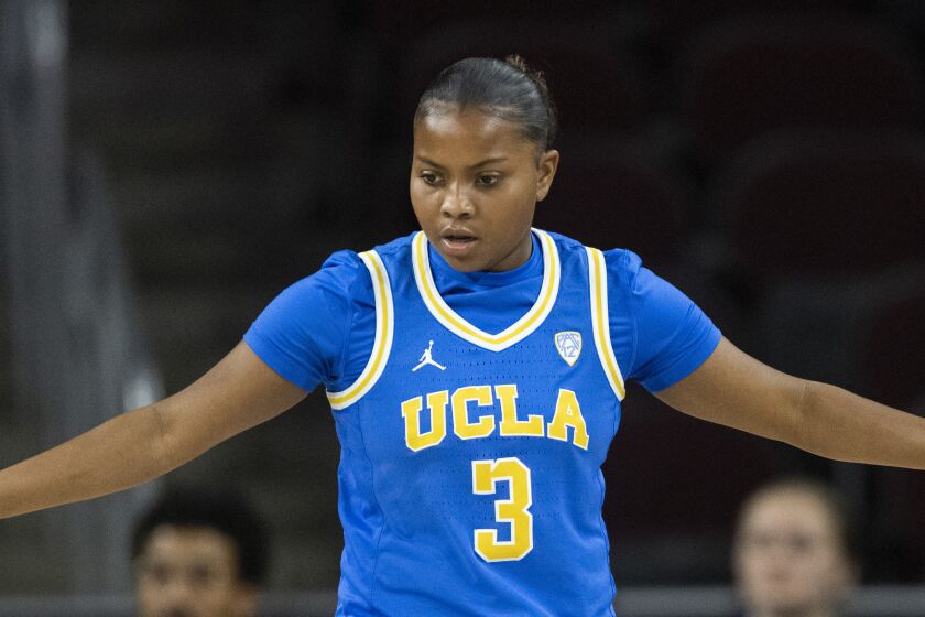 UCLA guard Londynn Jones (3) takes her stance during an NCAA basketball game against.