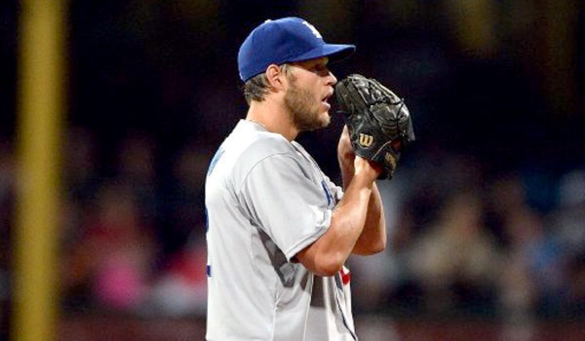 Dodgers pitcher Clayton Kershaw could be out a month because of inflammation in a back muscle.