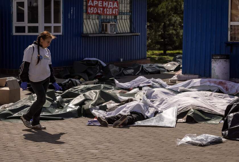 Bodies are covered at a train station in Kramatorsk, Ukraine.