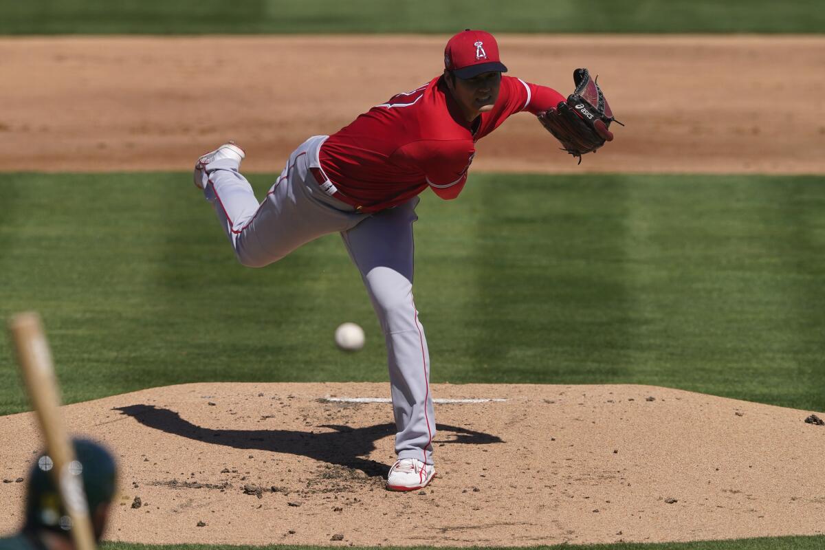 Angels pitcher Shohei Ohtani throws against the Oakland Athletics.