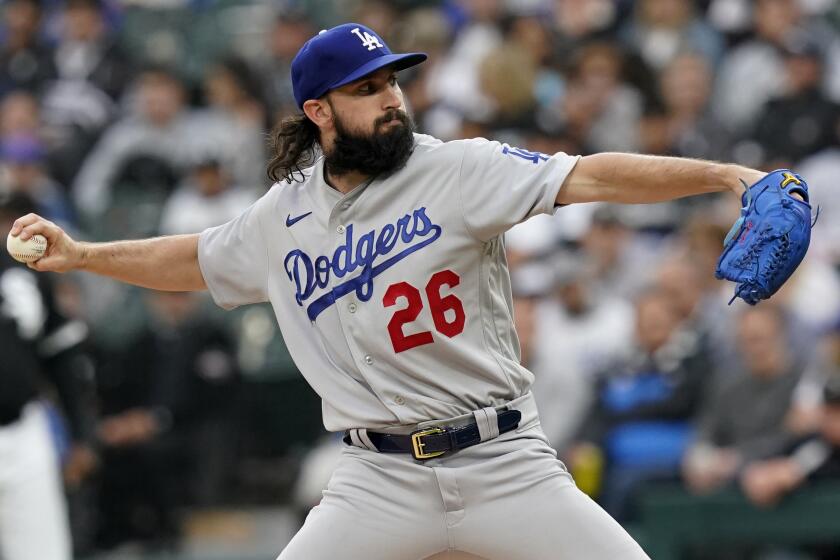 Los Angeles Dodgers starting pitcher Tony Gonsolin delivers to a Chicago White Sox batter.