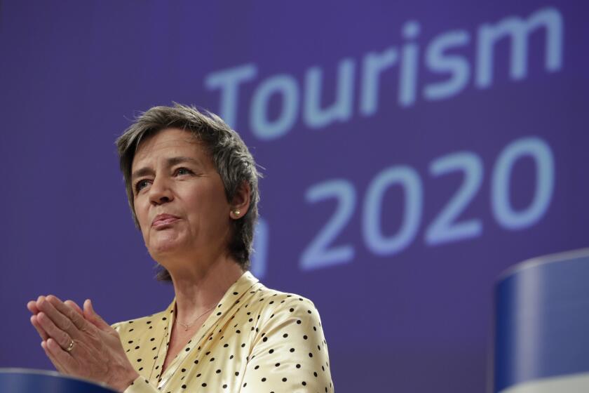 European Commission Vice-President Margrethe Vestager speaks during a media conference regarding tourism at EU headquarters in Brussels, Wednesday, May 13, 2020. The European Union unveiled Wednesday its plan to help citizens across the 27 nations salvage their summer vacations after months of coronavirus lockdown, and to resurrect Europe's badly battered tourism industry. (Olivier Hoslet, Pool Photo via AP)