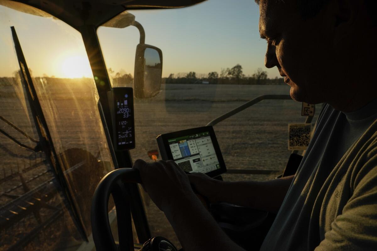 Jed Clark drives his combine while harvesting soybeans.