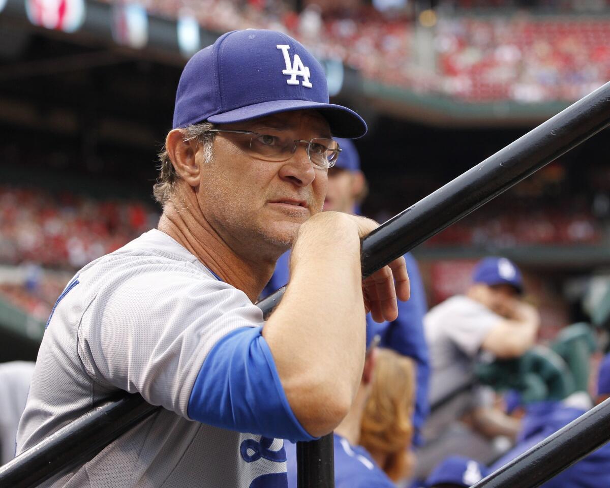Don Mattingly looks on from the dugout during a game against the Cardinals is St. Louis on May 29.