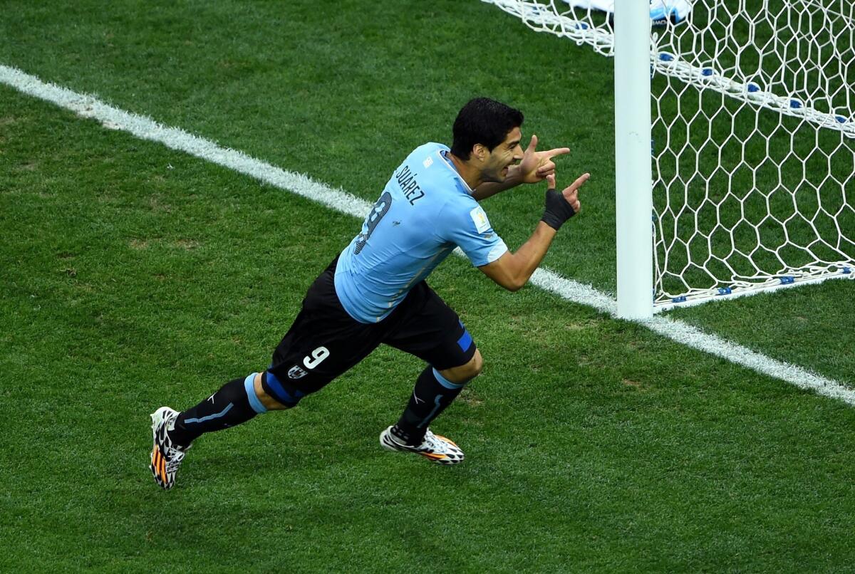 Luis Suarez scored two goals on two attempts in Uruguay's 2-1 win over England on Thursday in a group stage match.