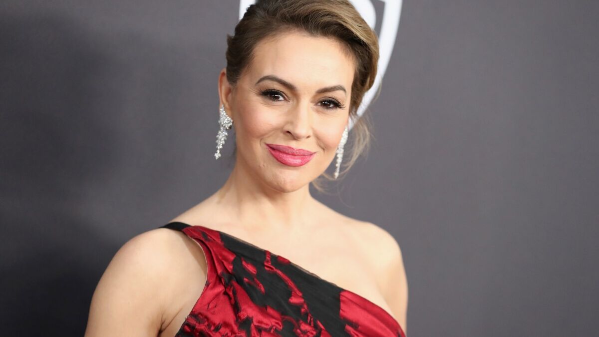 Actress Alyssa Milano's tweets about Make America Great Again hats have sparked an angry response.