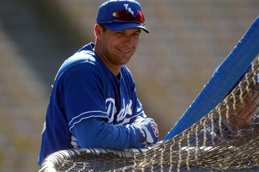 Former Dodgers hitting coach Dave Hansen, shown here in 2002, will now be the Angels' new hitting coach.