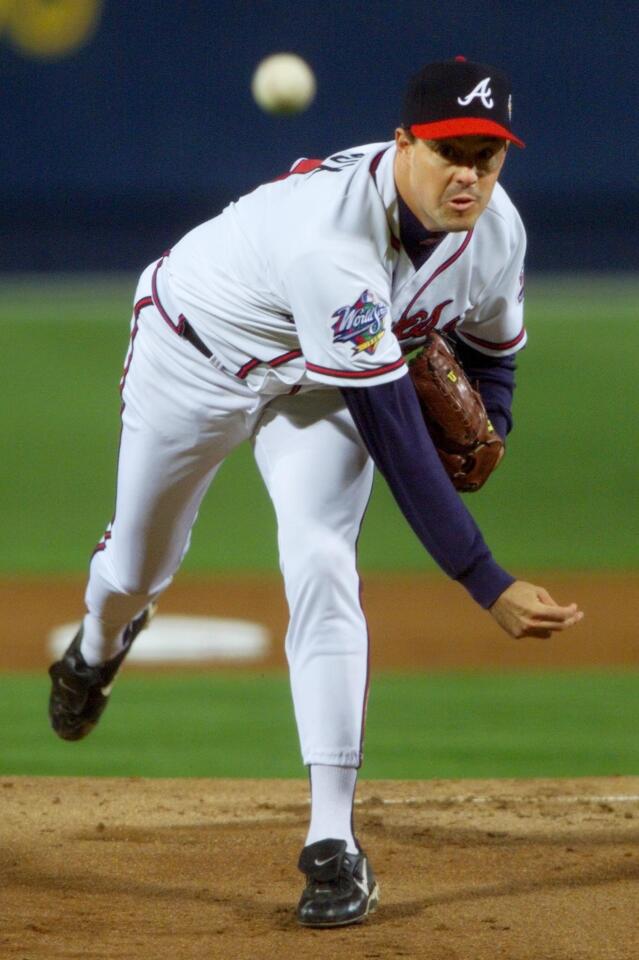 BRAVES PITCHER GREG MADDUX PITCHES IN GAME 1 OF THE WORLD SERIES
