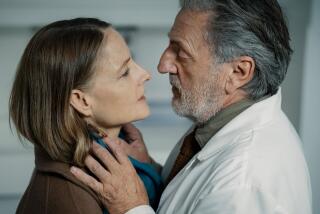 A woman is examined closely by a doctor, also her ex-husband.