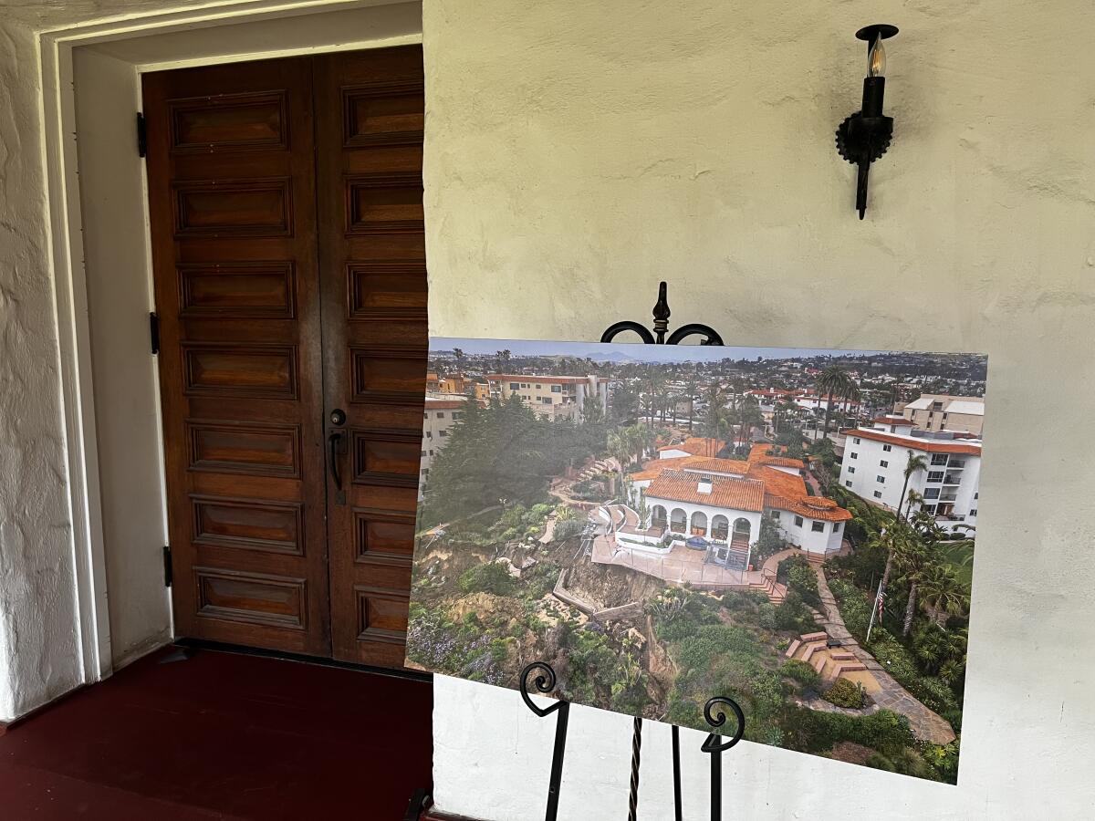 Casa Romantica's main salon remains closed as a portrait of the landslide is perched outside its doors.