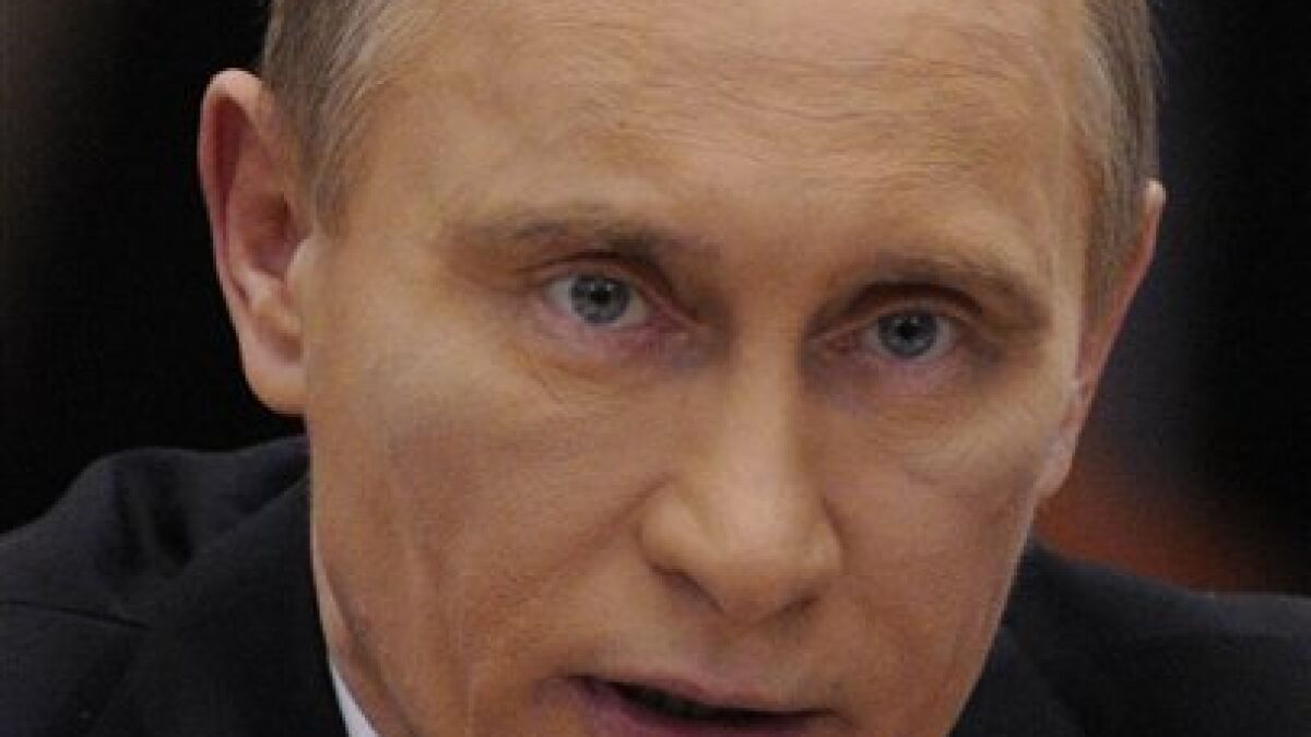 Heavy makeup, dark eyes Putin - The San Union-Tribune