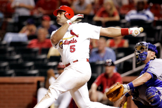St. Louis Cardinals Albert Pujols connects for his 14th inning game winning solo home run against the Los Angeles Dodgers.