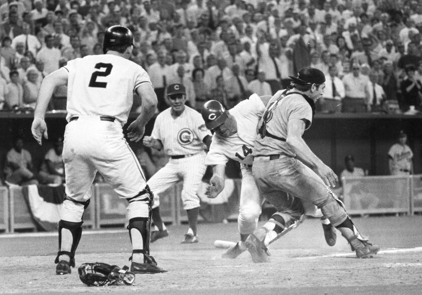 In this July 14, 1970, file photo, National League's Pete Rose slams into American League's Ray Fosse to win All-Star Game.