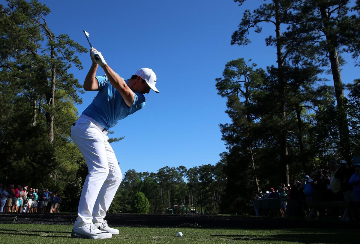Rory McIlroy plays his shot from the sixth tee during a practice round on April 5 before the start of the 2016 Masters Tournament at Augusta National Golf Club.