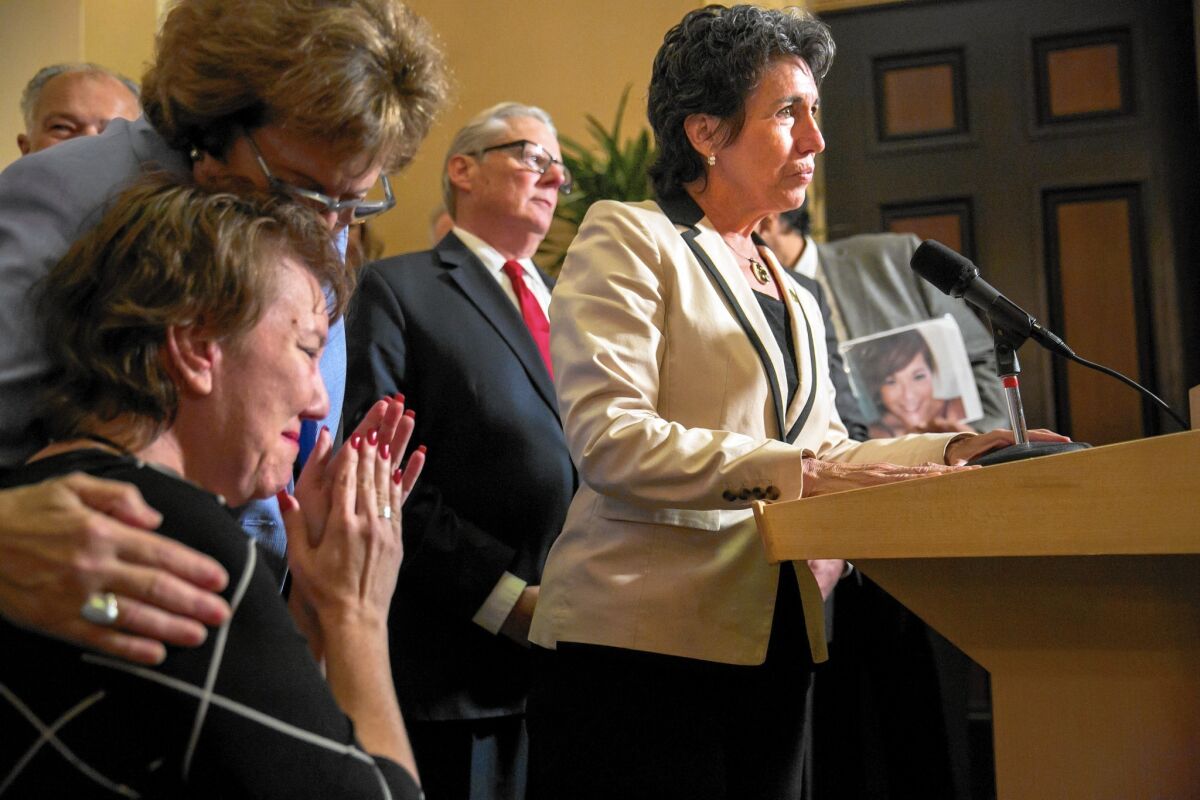 Assemblywoman Susan Talamantes Eggman, right, announces approval of the aid-in-dying legislation in the state Senate in Sacramento in September.