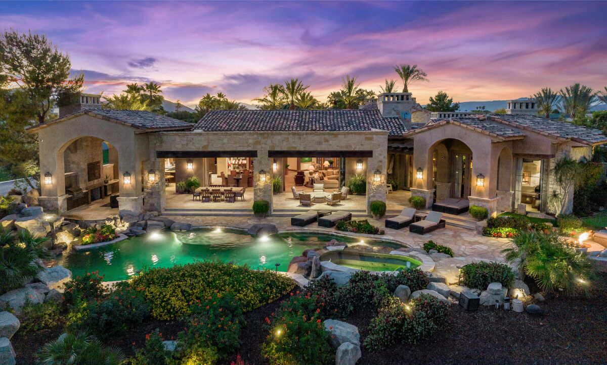 The golf course estate includes a main house, guesthouse, waterfall, swimming pool and putting green.