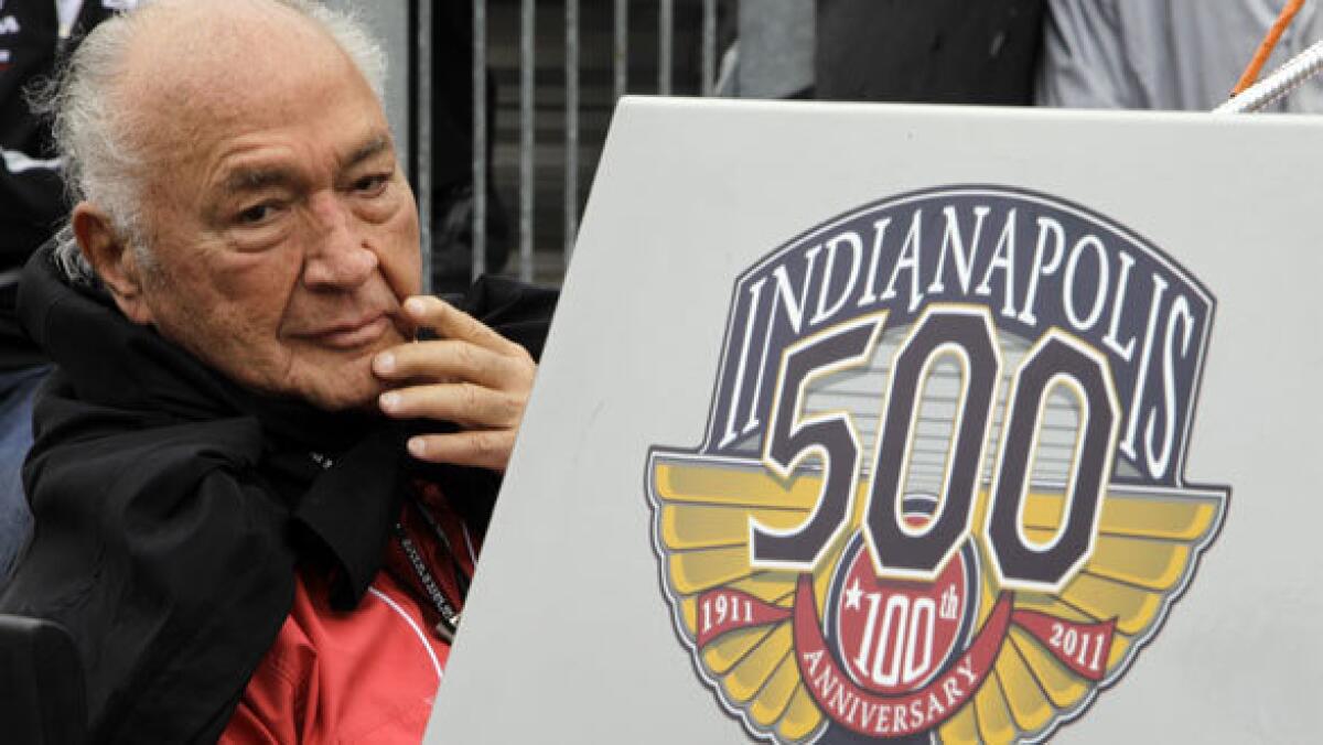Indy 500 legend Andy Granatelli looks on during the drivers' meeting for the Indianapolis 500 auto race at the Indianapolis Motor Speedway in Indianapolis. Granatelli, the former CEO of STP motor oil company who made a mark on motorsports as a car owner, innovator and entrepreneur, died Sunday.