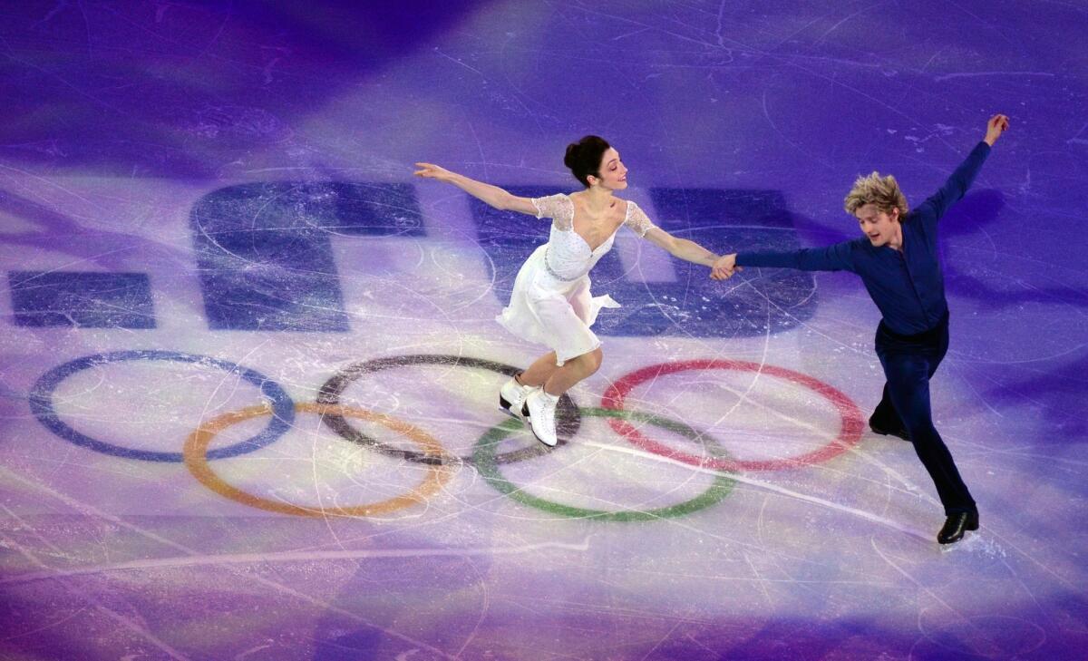 Charlie White and Meryl Davis perform at the Figure Skating Exhibition Gala at the Iceberg Skating Palace during the Sochi Winter Olympics.