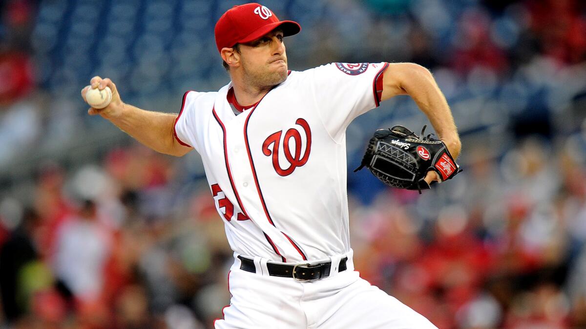 Nationals starter Max Scherzer delivers a pitch against the Tigers in the first inning Wednesday night.