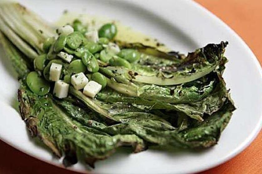KEEP IT SIMPLE: Grilled romaine with fava beans and pecorino.