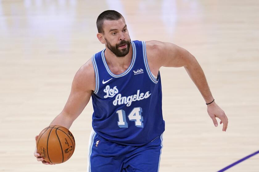 Los Angeles Lakers center Marc Gasol dribbles during an NBA basketball game against the Brooklyn Nets Thursday, Feb. 18, 2021, in Los Angeles. (AP Photo/Marcio Jose Sanchez)