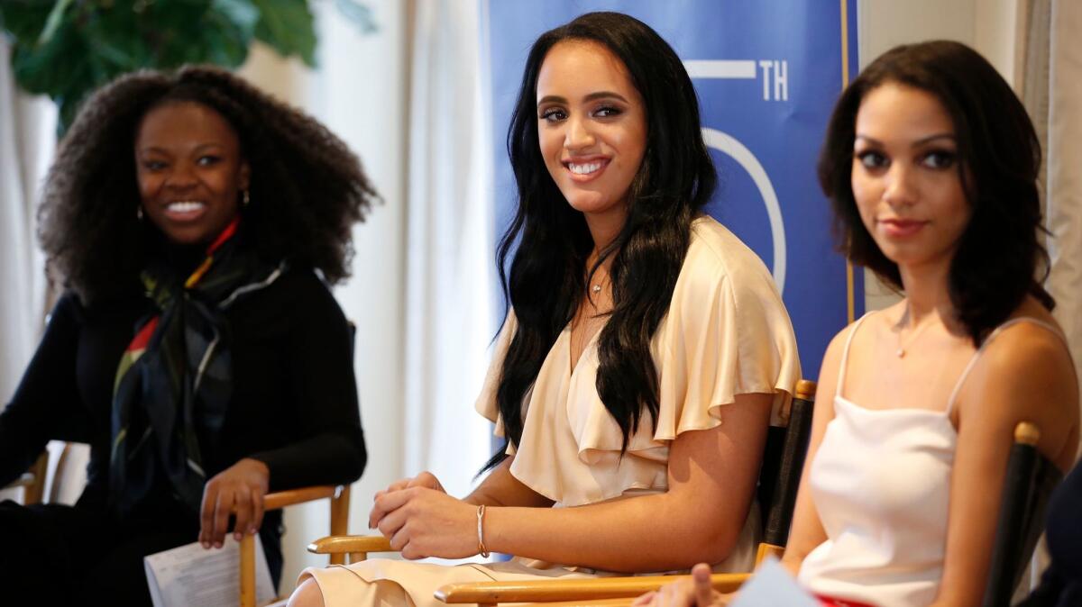 2018 Golden Globe Ambassador Simone Garcia Johnson, center, took part in a panel discussion with GlobalGirl Media alumna Precious Fasakin, left, and 2016 Miss Golden Globe Corinne Foxx during Golden Globes preview day at the Beverly Hilton hotel.