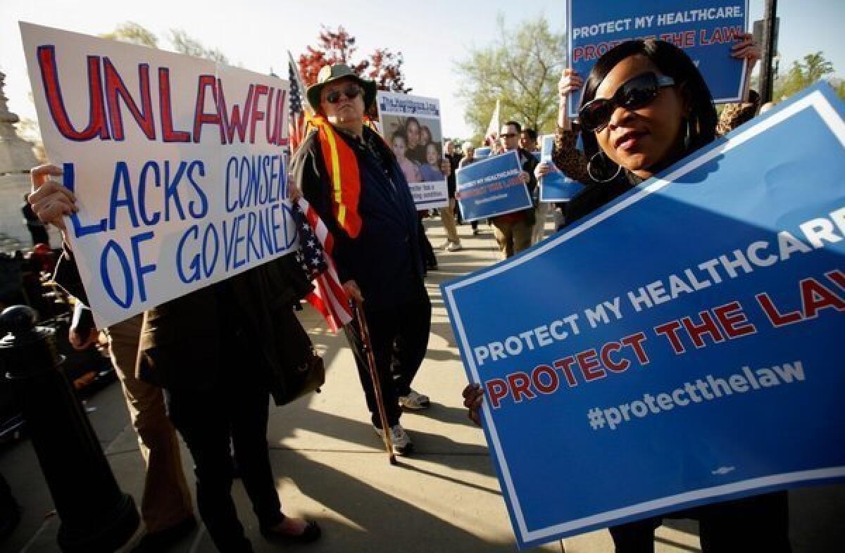 Supporters and opponents of the 2010 Affordable Care Act demonstrate outside the Supreme Court, which declared the law and its coverage requirements constitutional.