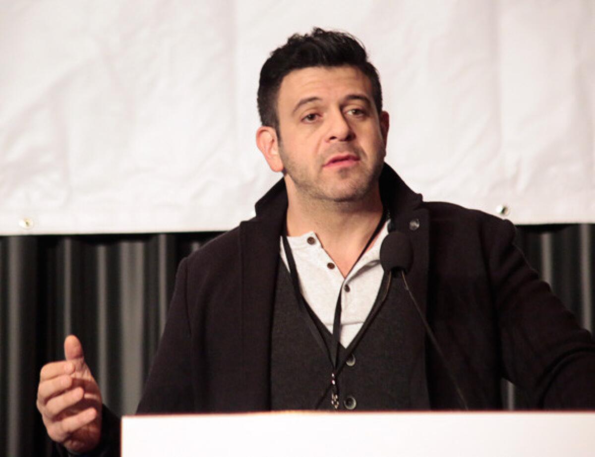 "Find out about those local gems," food man Adam Richman advised visitors to the L.A. Times Travel Show on Sunday.