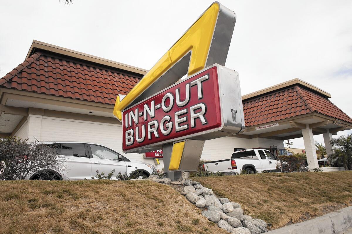 Some patrons of this In-N-Out Burger’s restaurant on West 19th Street in Costa Mesa said they're pleased with the chain’s announcement that it is committed to using beef that is not raised with antibiotics.