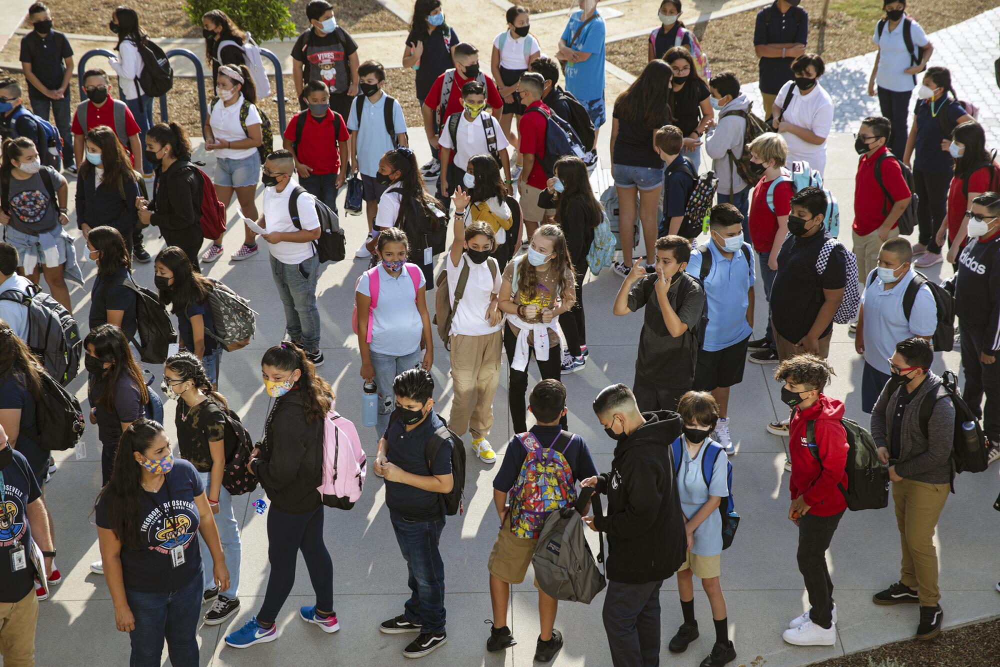 Students assemble on the first day of full-time, in-person instruction since the start of the pandemic.