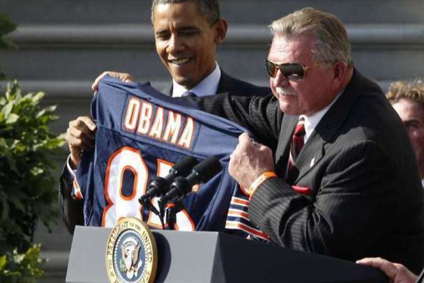 Mike Ditka, right, said he wished he had run against Barack Obama in 2004 for U.S. Senate in Illinois, because it could have meant Obama wouldn't be in the White House today.
