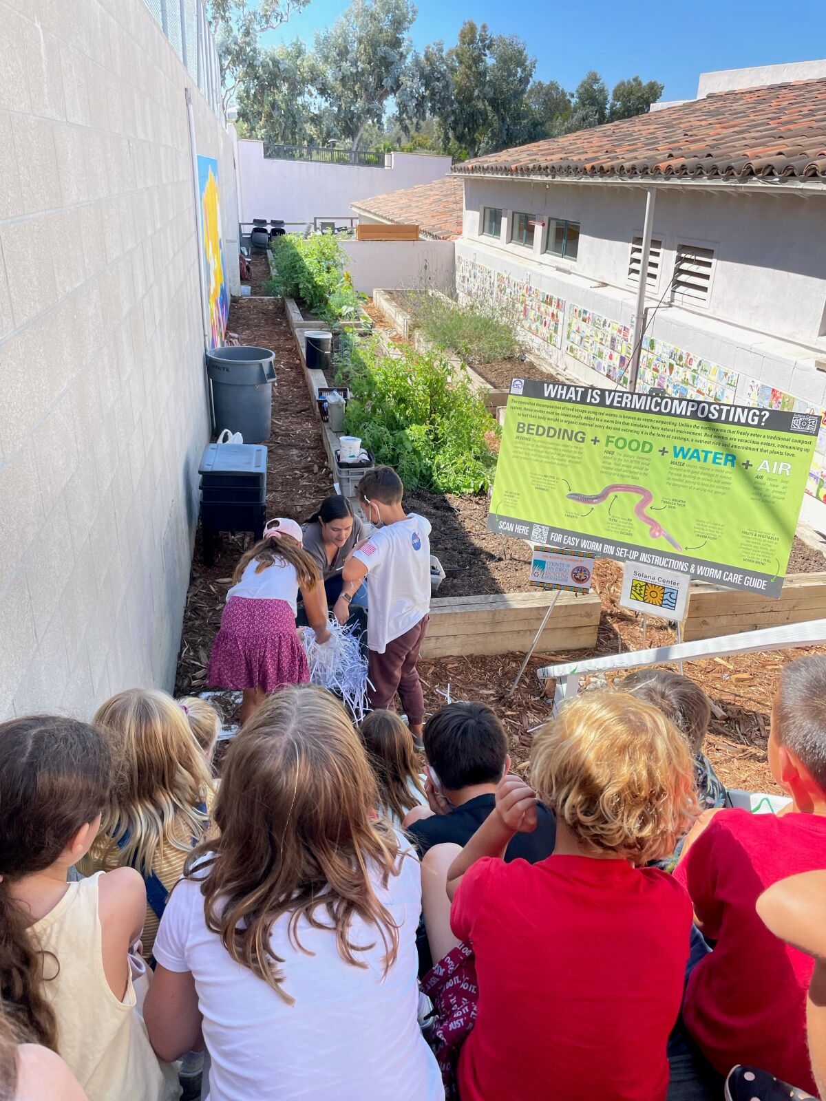 Students learn about worm composting with a visit from Solana Center for Environmental Innovation.