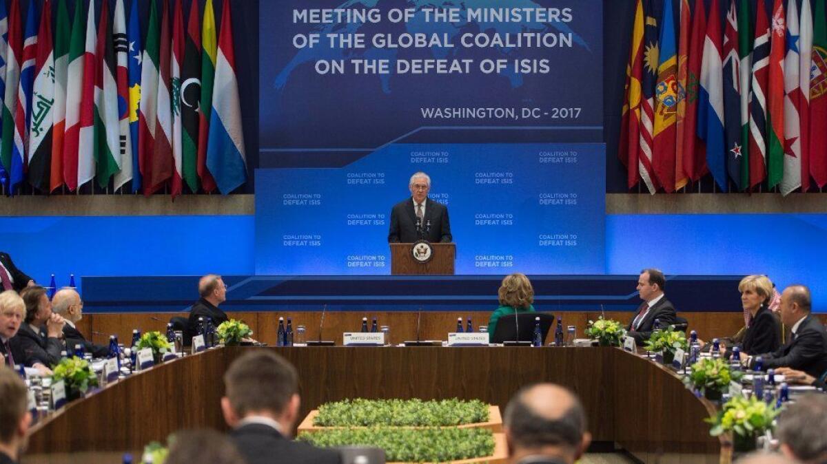 Secretary of State Rex Tillerson opens a meeting of the 68-nation, U.S.-led coalition to defeat the Islamic State militant group at the State Department in Washington on March 22, 2017.