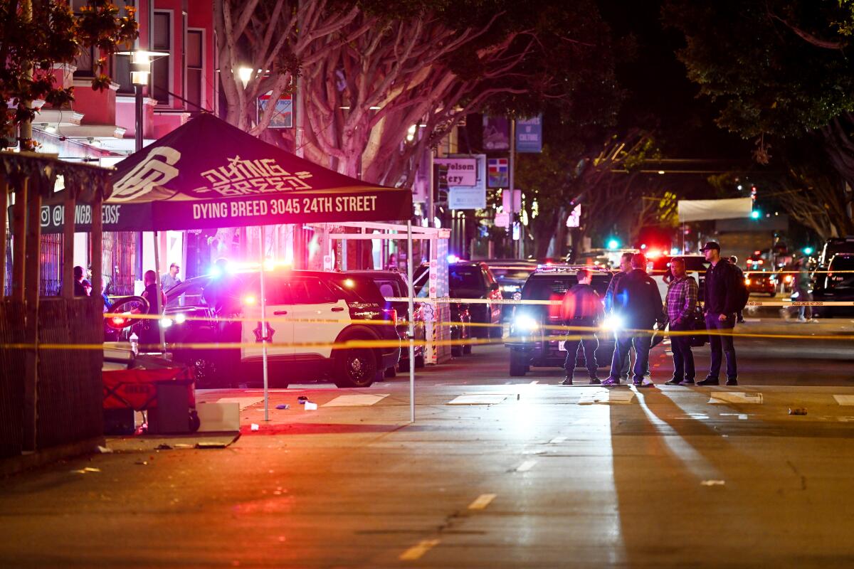Police take security measures after multiple people were shot on Friday night in Mission District of San Francisco.