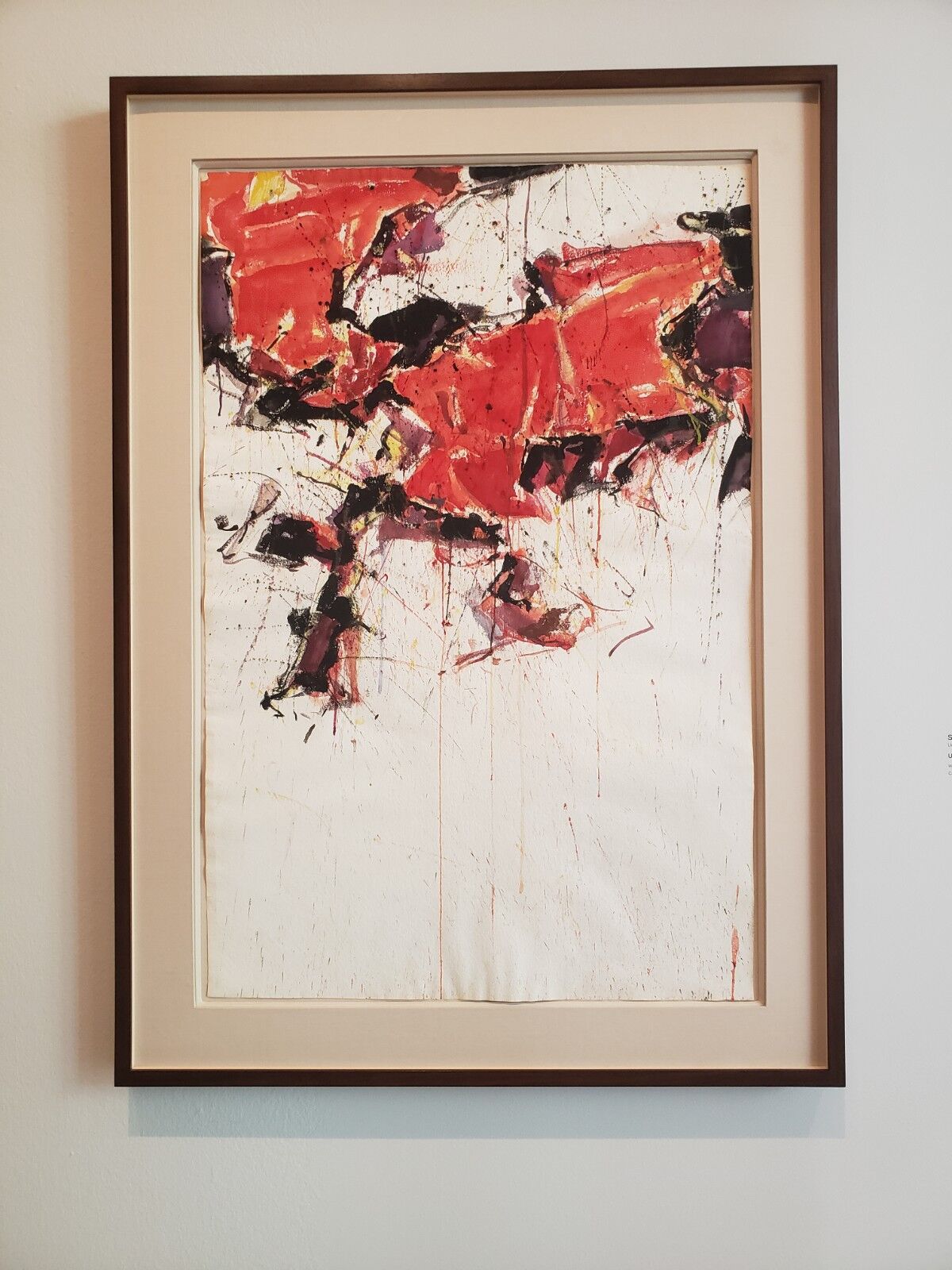 A framed abstract painting by Sam Francis