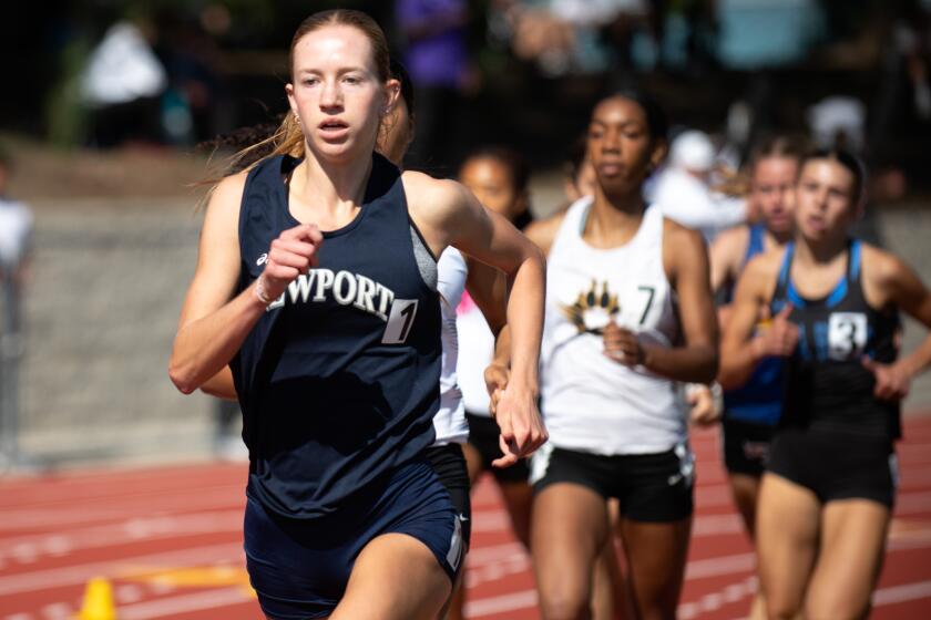 Newport Harbor's Keaton Robar pulls ahead at the CIF Southern Section track and field finals.