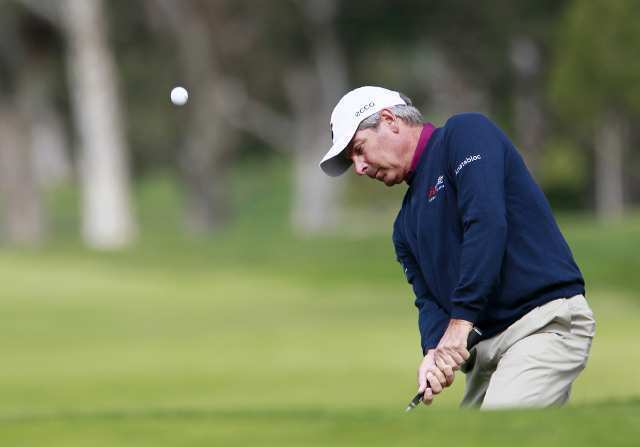 Fred Couples chips on at 15 during the pro-am at the Toshiba Classic on Thursday.