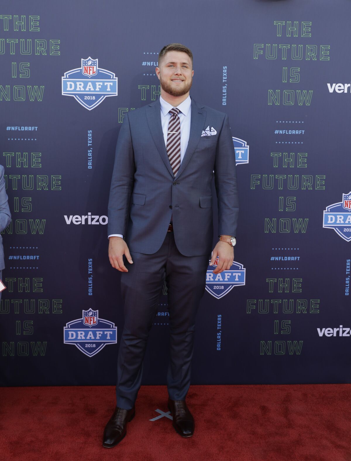 UCLA's Kolton Miller poses for photos on the red carpet.