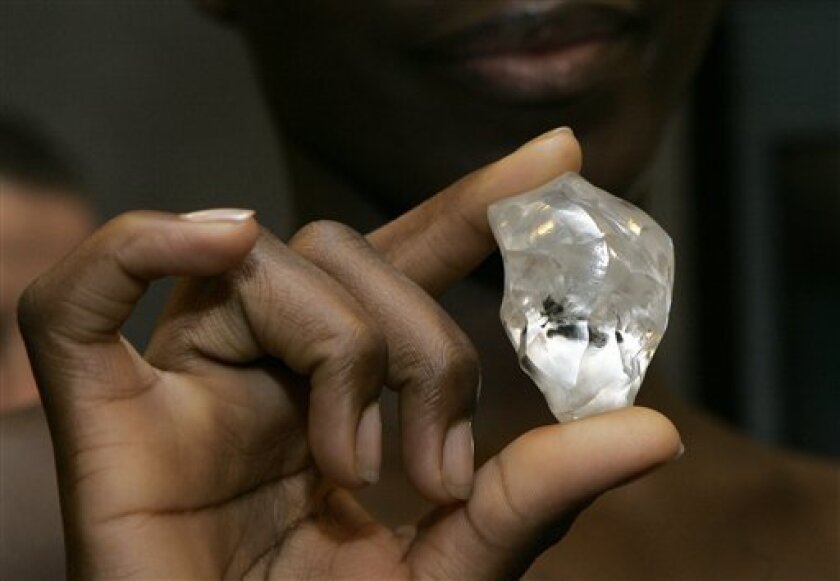 - A model holds the 'Letseng Legacy' diamond at the World Diamond Center in Antwerp, Belgium, in this Nov. 14, 2007, file photo. Traders, cutters and polishers are hopeful diamonds remain a girl's best friend this Christmas. Top world diamond industry players have announced plans at crisis talks in Antwerp, Belgium, Monday Nov. 17, 2008, to redouble their efforts to keep the shine on their multibillion dollar business. They want to lessen the effects of the financial crisis and economic downturn on their sector. (AP Photo/Virginia Mayo, file)