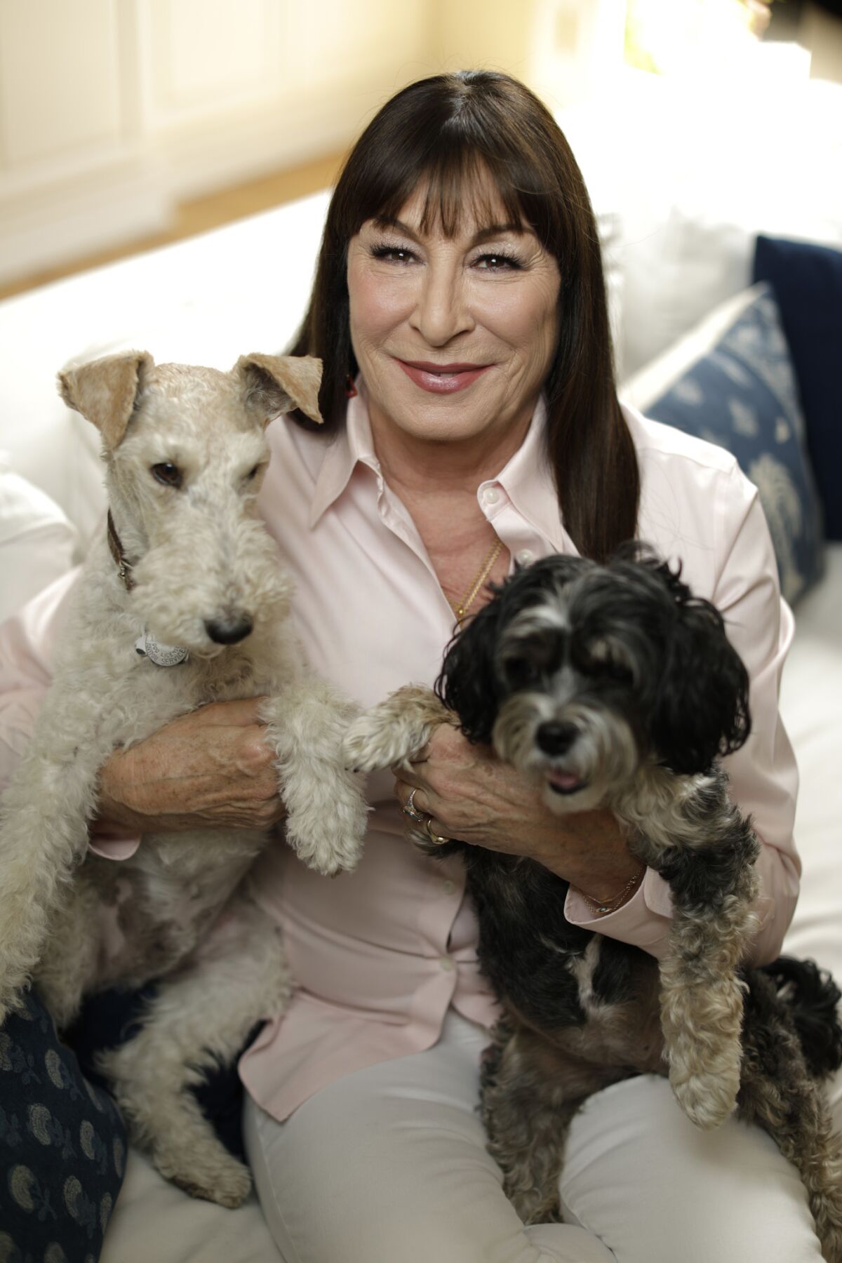 Anjelica Huston at home with her dogs, Oscar, left, and Pootie.
