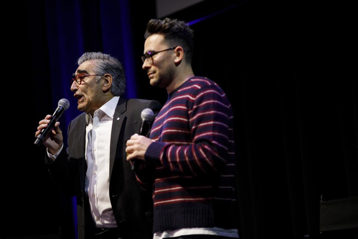 Actors Eugene Levy and Dan Levy speak during “Schitt’s Creek: Up Close & Personal” in September at the Theatre at Ace Hotel.