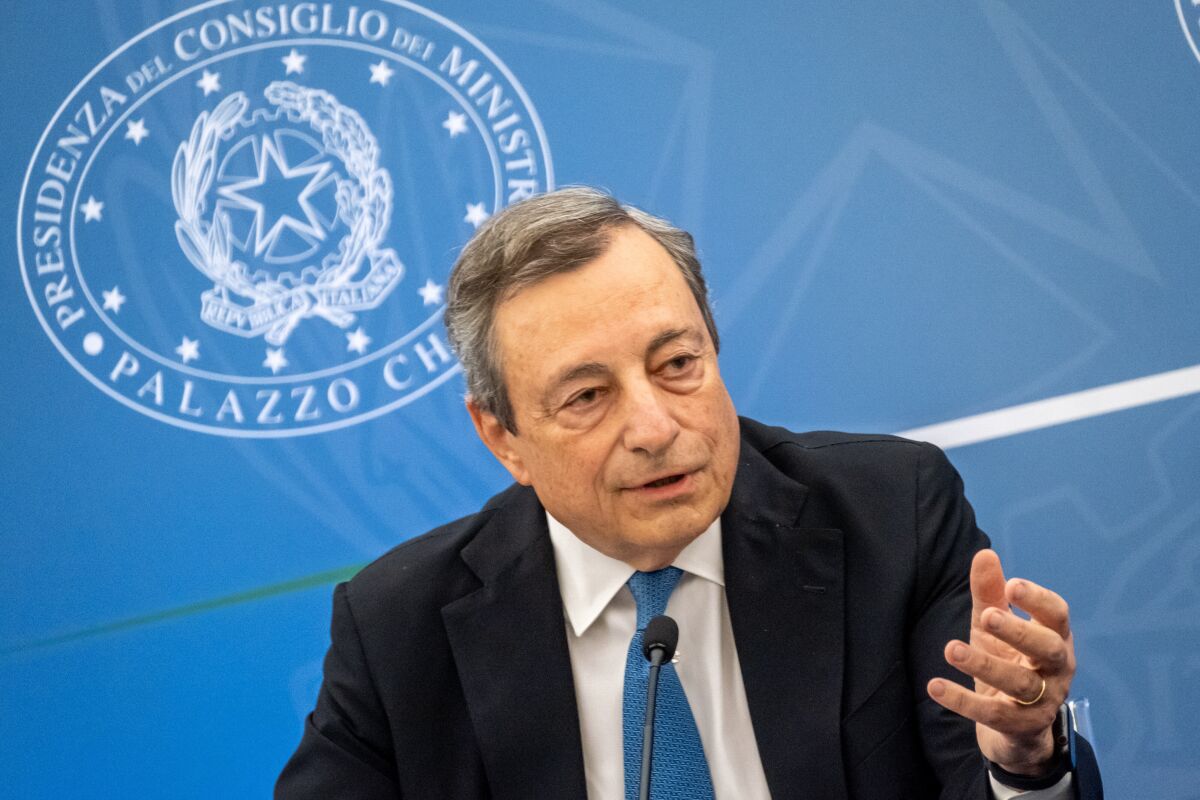 Italian Premier Mario Draghi talks to the media in Rome on Tuesday.