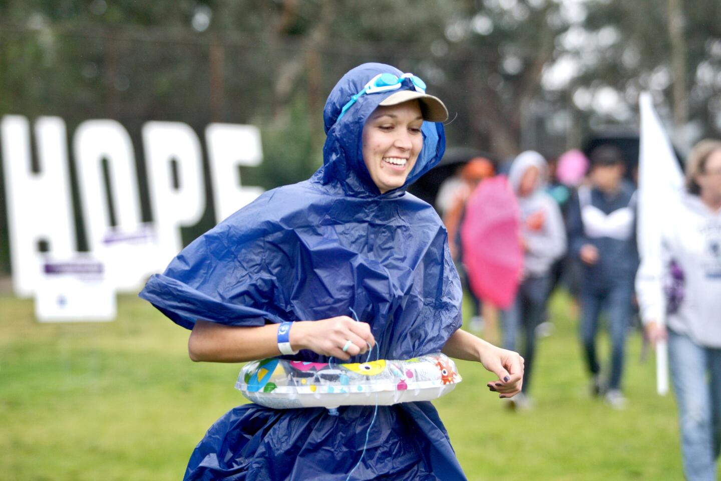 San Diego resident Jenna Olsen, 31, originally from La Crescenta, was ready for the rain at the annual Relay for Life of Foothills held at Clark Magnet High School in La Crescenta on Saturday, April 9, 2016. Olsen and her sister have been doing 26 miles during the walk for 13 years, in honor of their father and marathon runner John Olsen, who passed away in 2007 after a battle with brain cancer. Twenty-six groups signed up for the 24-hour walk to raise money for the American Cancer Society.