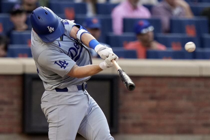 Los Angeles Dodgers' Will Smith hits a home run during the eighth inning of a baseball game against the New York Mets, Wednesday, May 29, 2024, in New York. (AP Photo/Frank Franklin II)