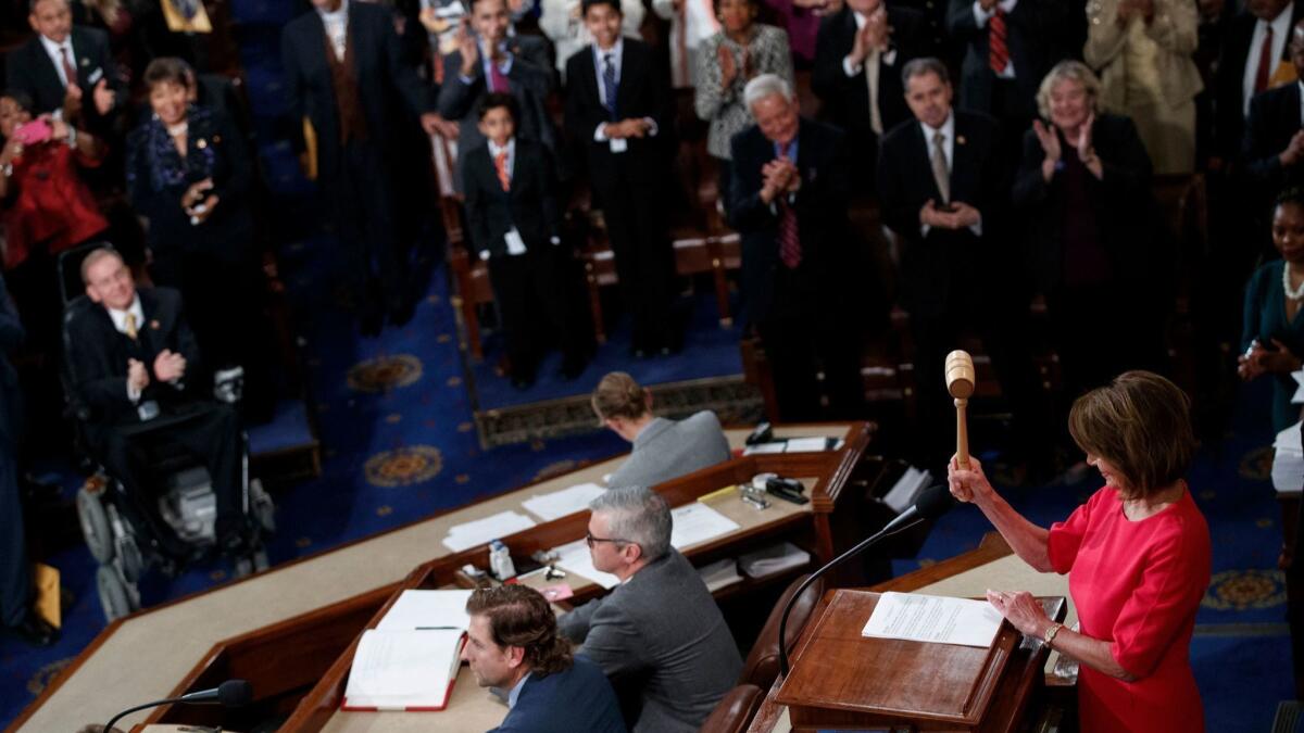 Rep. Nancy Pelosi (D-San Francisco) wields the gavel again as speaker of the House.